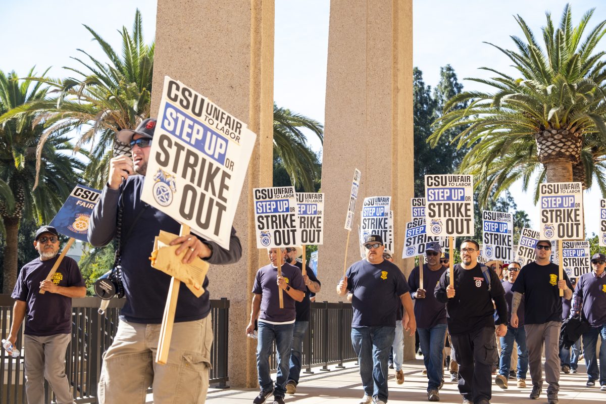 Teamsters Local 2010 members and supporters march on strike outside the CSUN library on Nov. 14.
