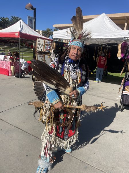 Tommy Tomahawk, a Northern traditional dancer at CSUNs 38th Annual Powwow event in Northridge, Calif., on Nov. 25, 2023.