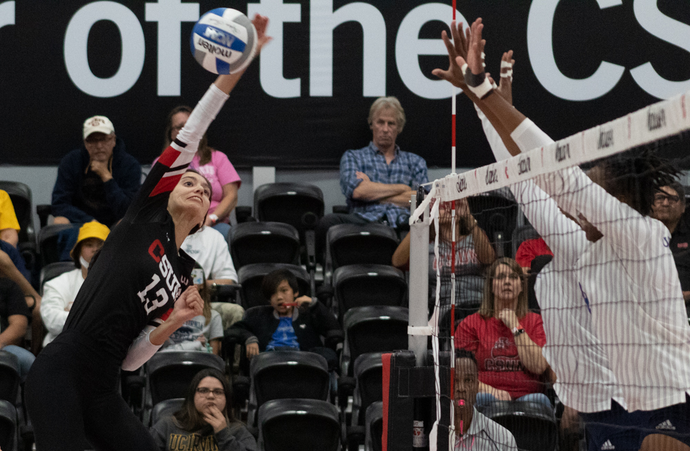 Outside hitter Nicole Nevarez, 13, makes CSUN womens volleyball history by achieving 1,000 kills, while playing against UC Irvine on Oct. 29, 2022, at the Premier America Credit Union Arena in Northridge, Calif.
