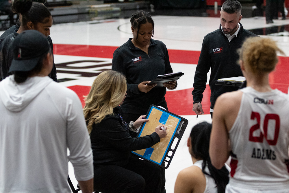 File+photo.+Head+coach+Carlene+Mitchell+writes+a+play+down+on+a+dry-erase+board+during+a+timeout+against+Cal+State+Bakersfield+on+Thursday%2C+Feb.+15%2C+2024%2C+at+the+Premier+America+Credit+Union+Arena+in+Northridge%2C+Calif.