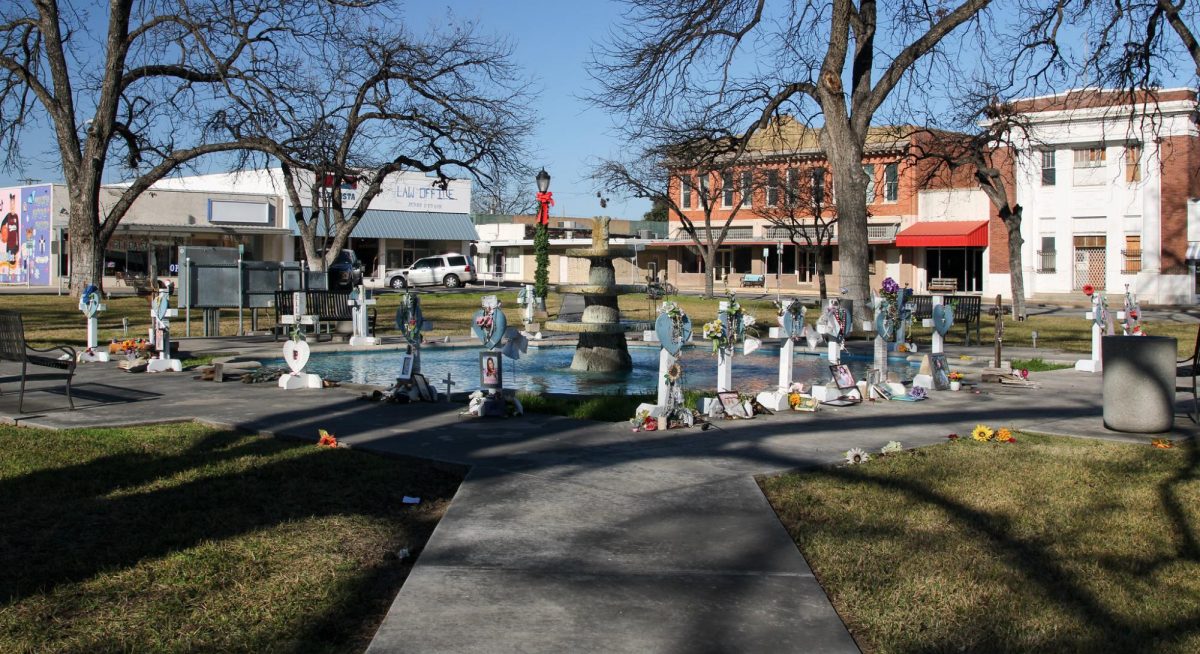 Crosses circling a fountain in Uvaldes town square, honoring the victims of the shooting.