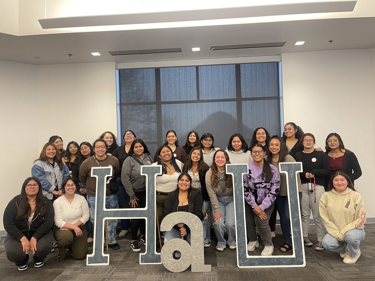 Members of Hermanas Unidas pose for a Photo during their “Hermana Week” gathering. 