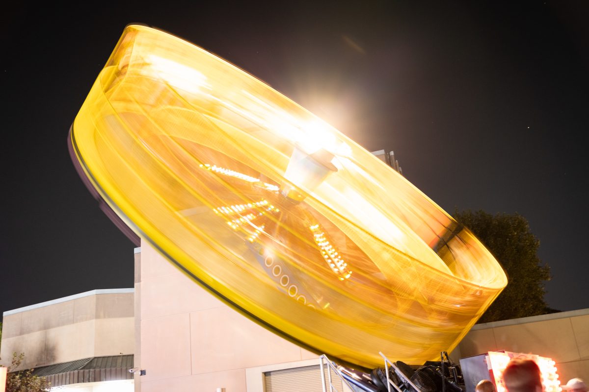 The roundup carnival ride spinning during Matador Nights on Friday, Sept. 13 near the Plaza del Sol on campus. 