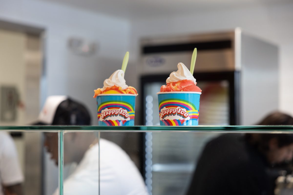 Water ice with soft-served gelati on top ready for customers to take at the grand opening of Happy Ice in Northridge, Calif., on Saturday, Sept. 14.