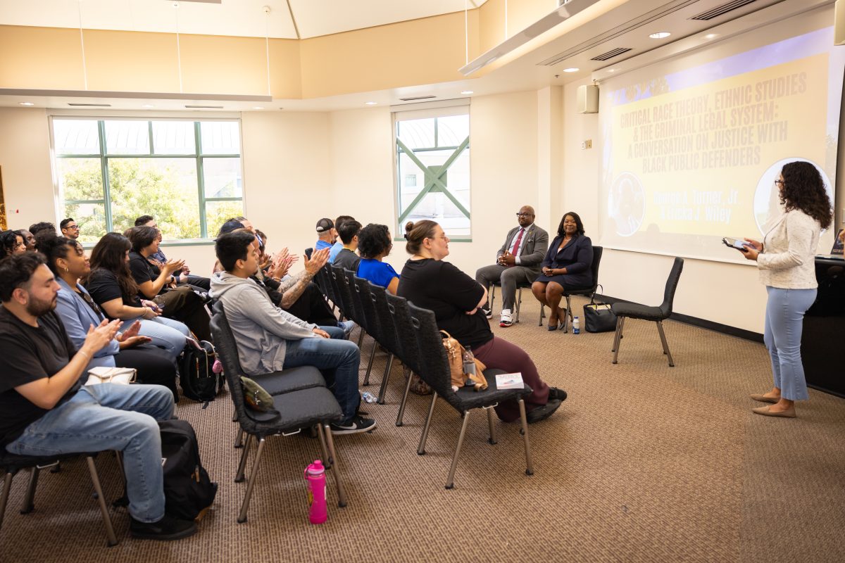 Left to right: Public defenders George A. Turner, Jr., and Ericka J. Wiley are introduced to CSUN faculty and students by Assistant Professor of Criminology and Justice Studies Nalya Rodriguez, at the 'Critical Race Theory, Ethnic Studies & the Criminal Legal System: A Conversation on Justice With Black Public Defenders' event in the Thousand Oaks room of the University Student Union on Monday, Oct. 21, 2024.