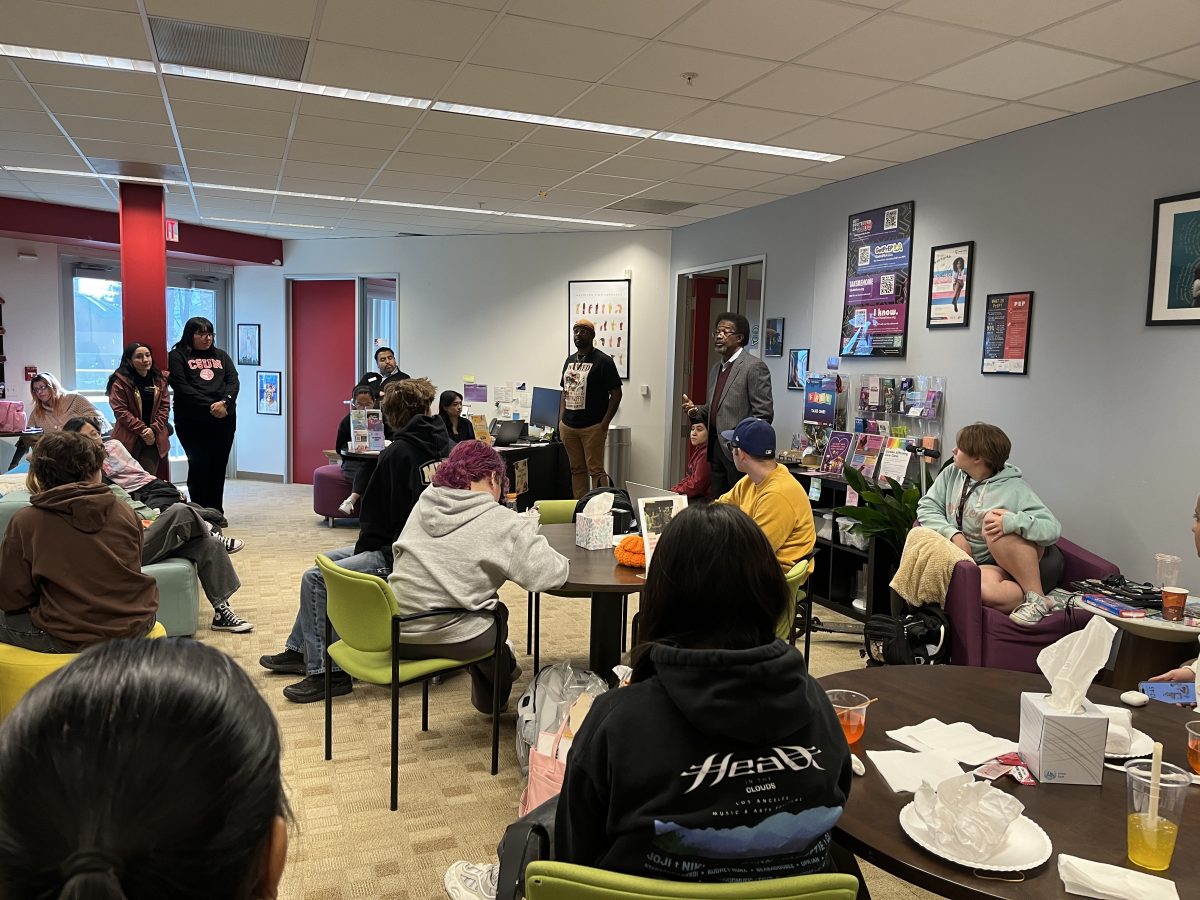 Vice President for Student Affairs, Dr. William Watkins, speaking and encouraging students in the CSUN Pride Center during the Days After: A Community Dialogue event on Thursday, November 7, 2024.