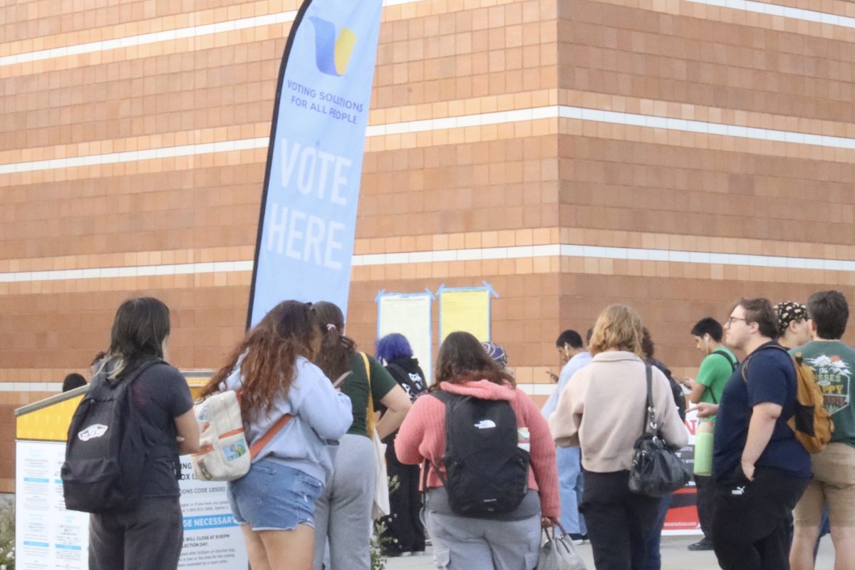 Students wait in line to cast their ballot outside Redwood Hall, Northridge, California on Tuesday, Nov. 5, 2024.