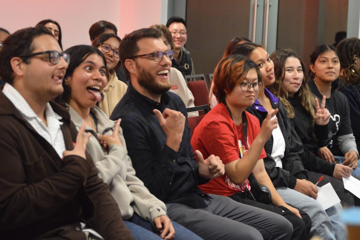 A.S. chair of diversity, equity and inclusion Omar Jwainat, Deaf CSUNians' Vice President Martha Jaimes-Suazo, guest speaker Zachary Lotane and students strike a funny pose on Thursday, Nov. 21