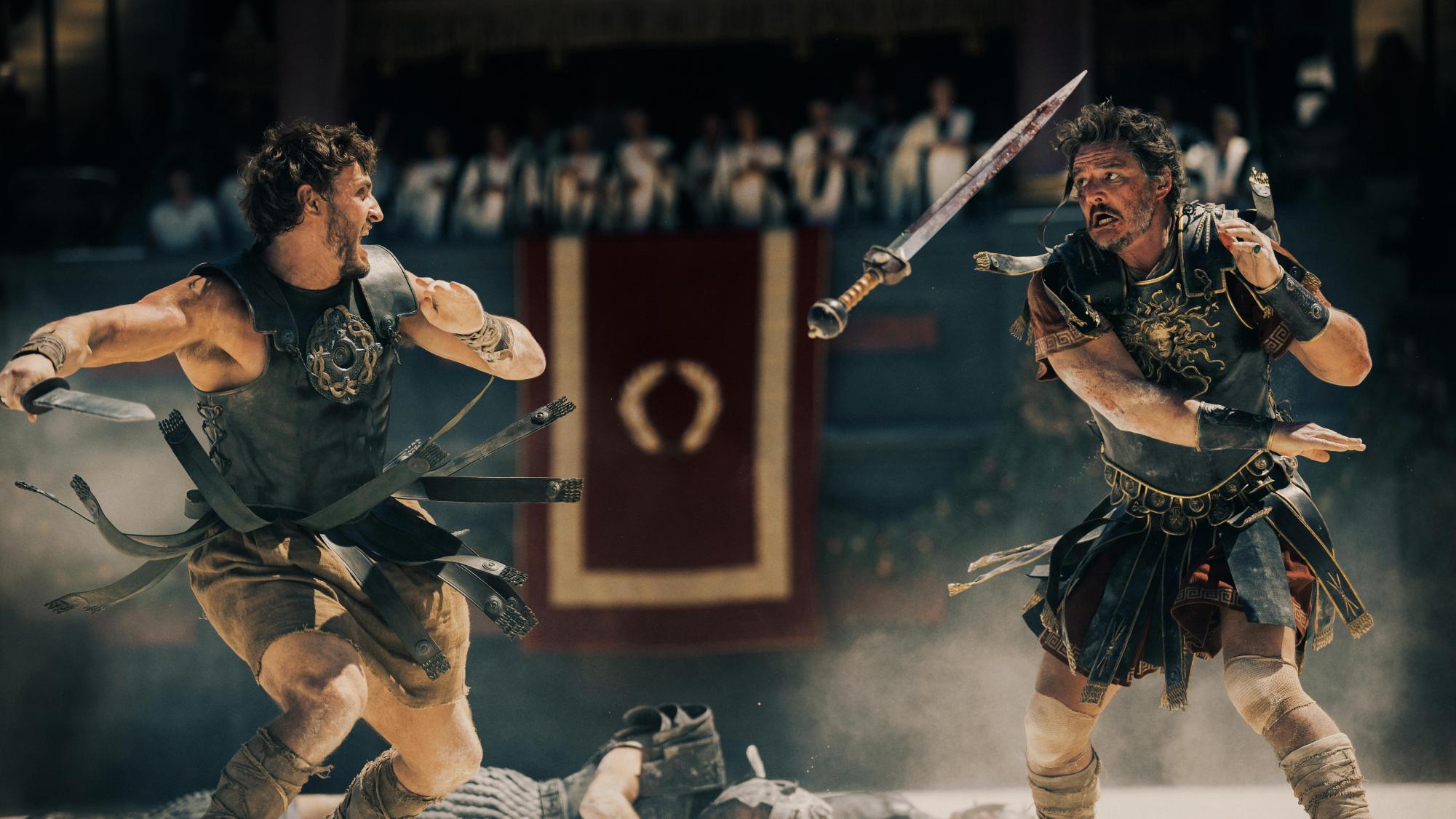 Left to right: Lucius (Paul Mescal) battling General Acacius (Pedro Pascal) in The Colosseum in the film "Gladiator II." Photo courtesy of IMDb.