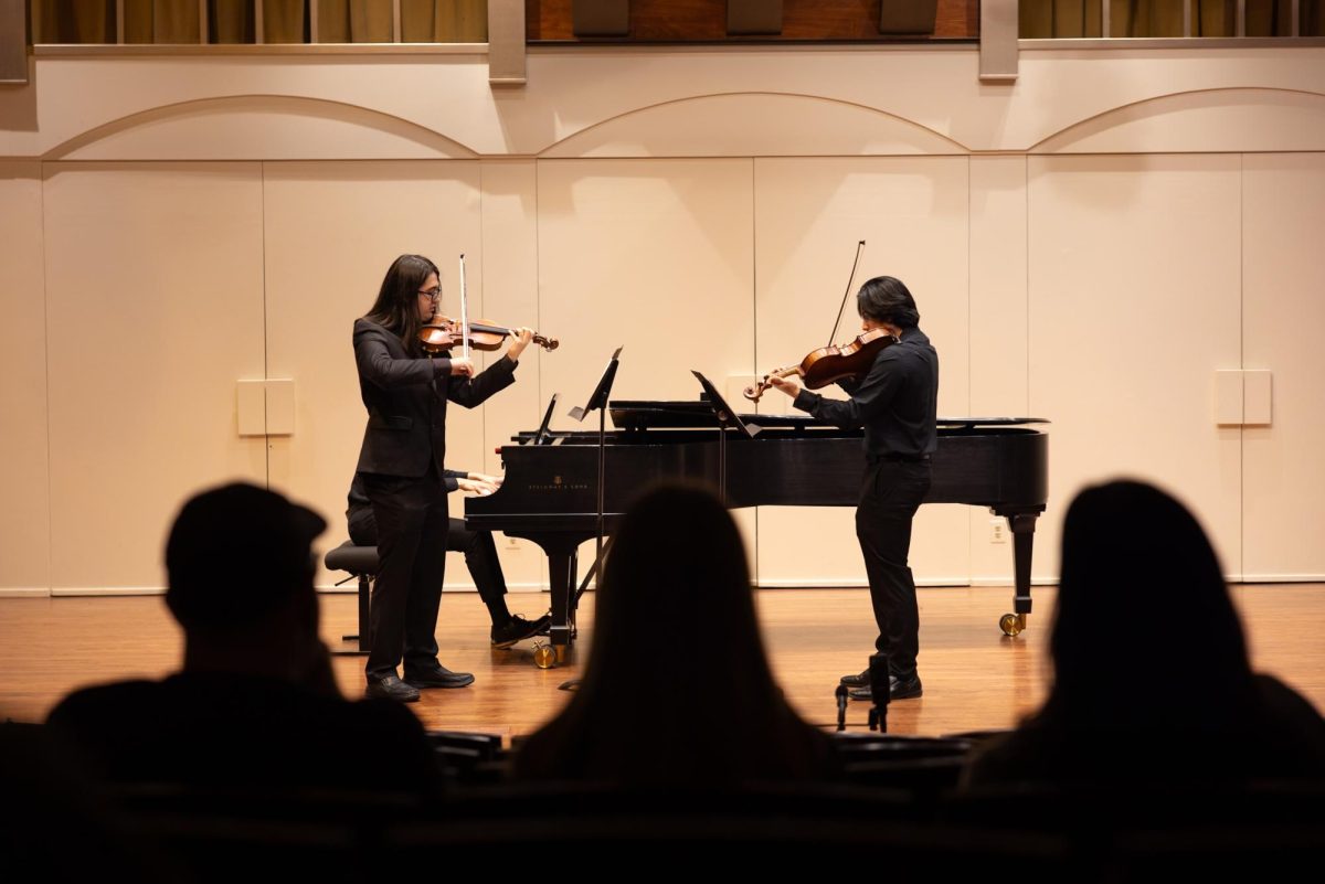 Student violinists perform in the Shigemi Matsumoto Recital Hall in Dec. 2024.