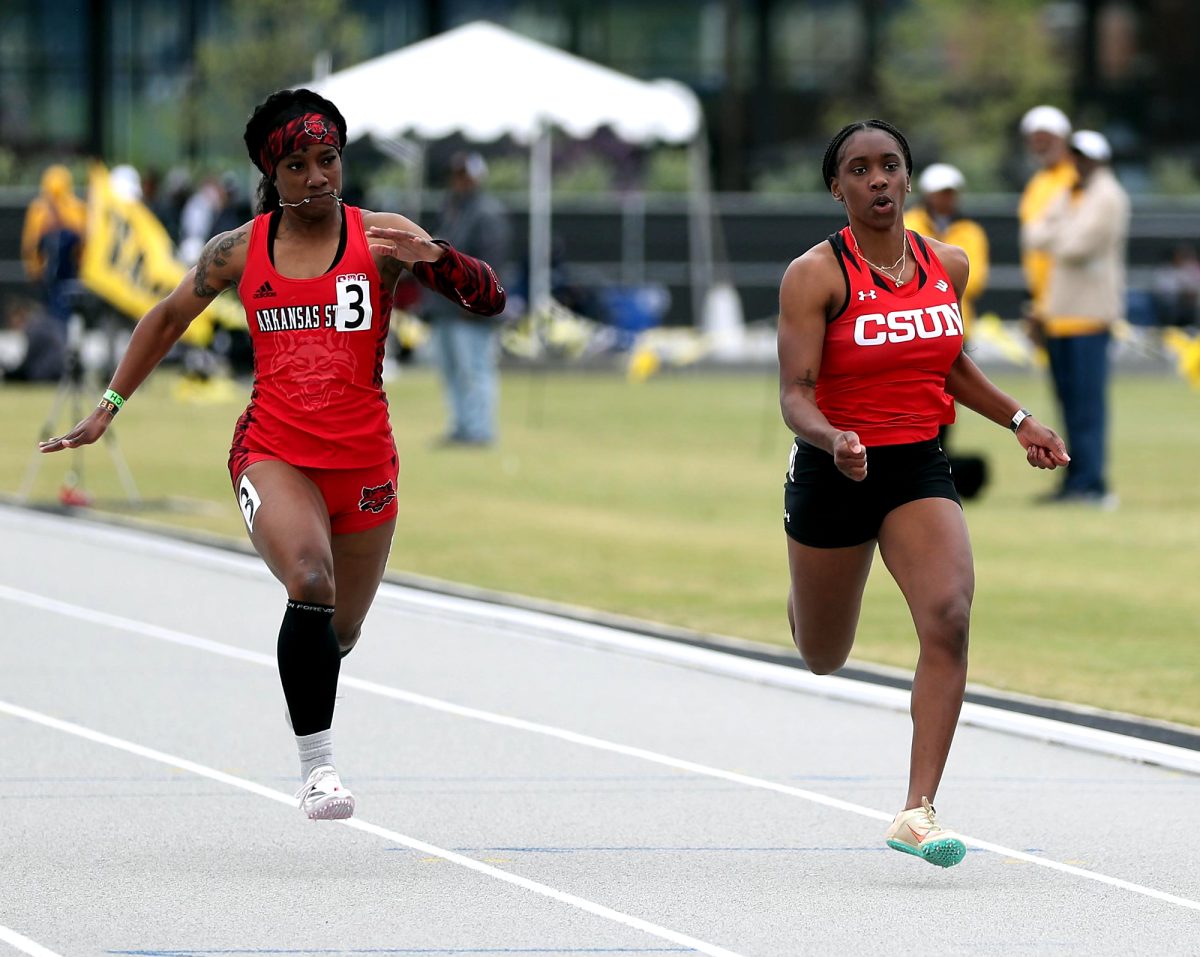 CSUN sprinter Kaliyah Poston sprinting to the finish line during a meet in 2024. 