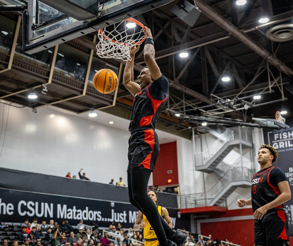 Matador forward Keonte Jones slams one down as the Matadors down Long Beach State at the Premier America Credit Union Arena in Northridge, Calif., on Jan. 23, 2025.