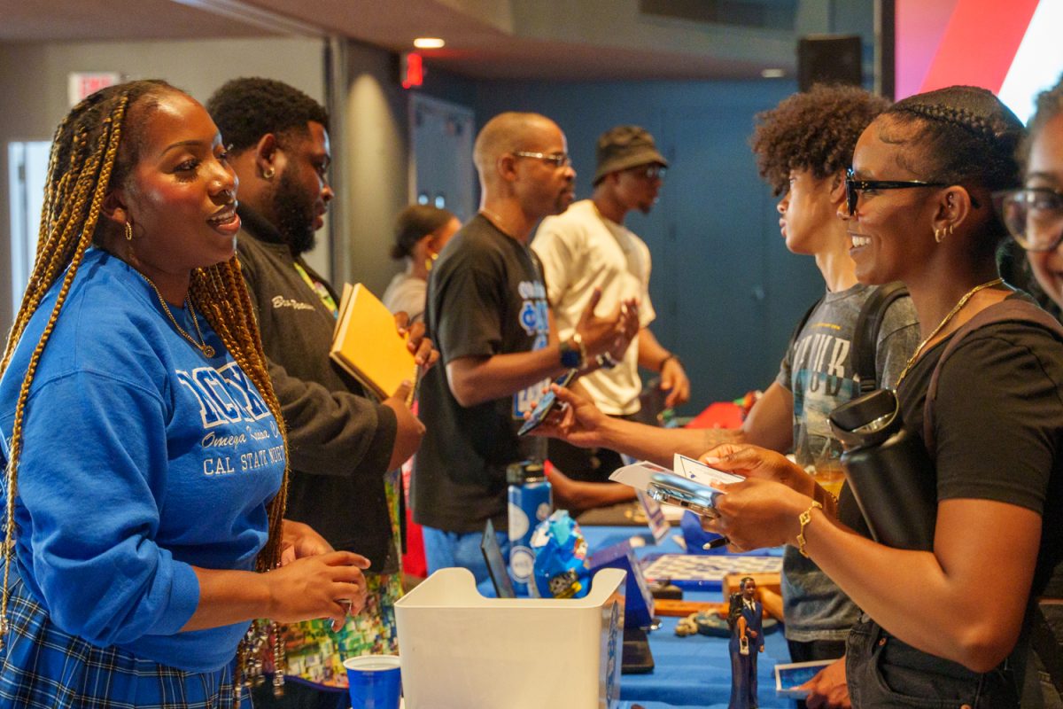 A student meets talks about services at Welcome Black Week. Northridge, Calif. on Tuesday, Sept. 12, 2023.