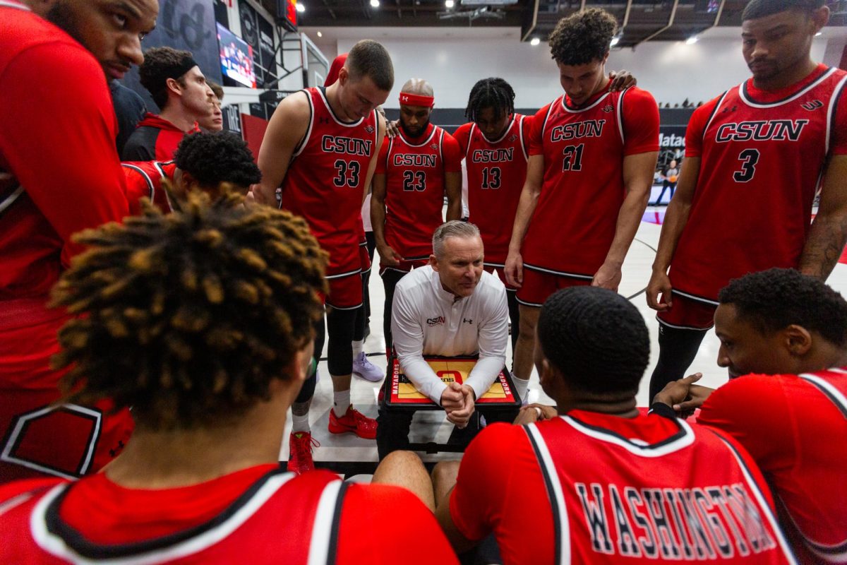 CSUN men's basketball head coach Andy Newman speaks to players before a game against Cal State Fullerton at the Premier America Credit Union Arena in Northridge, Calif., on Thursday, Feb. 6, 2025. The Matadors defeated the Titans 82-63. 