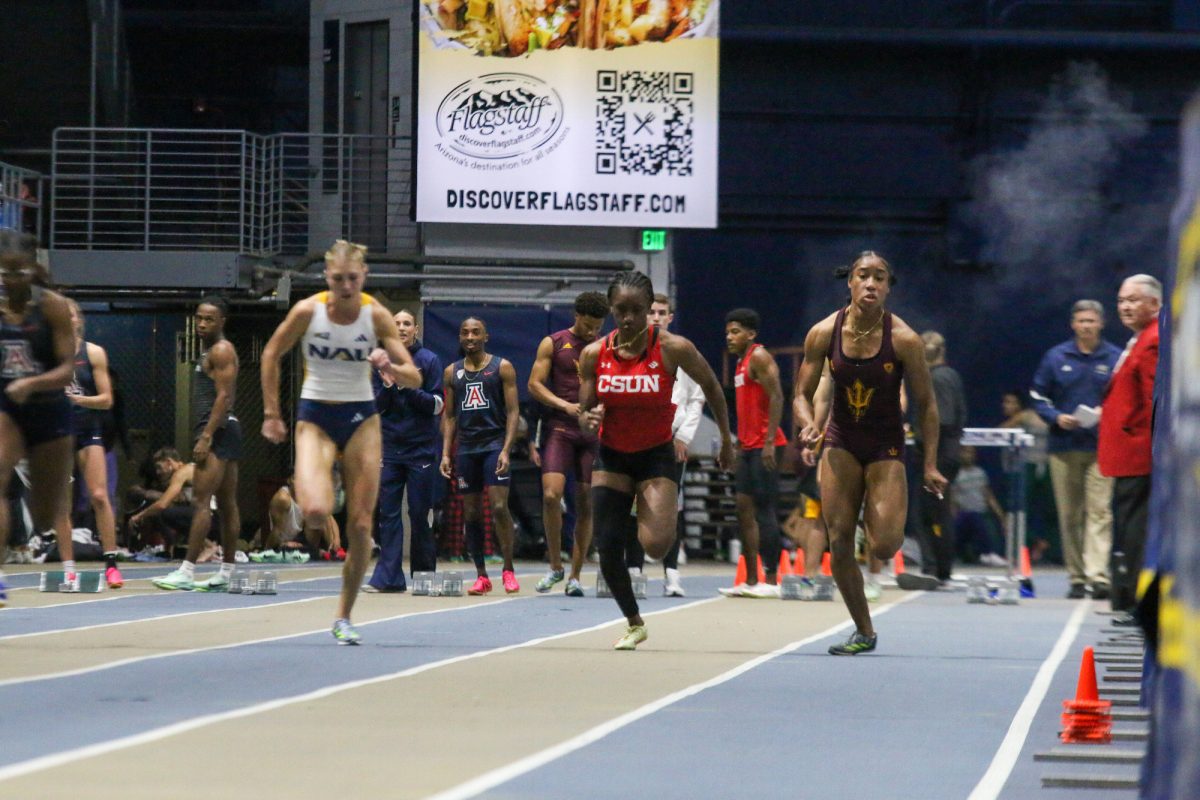 CSUN sprinter Kaliyah Poston racing to the finishing line. 