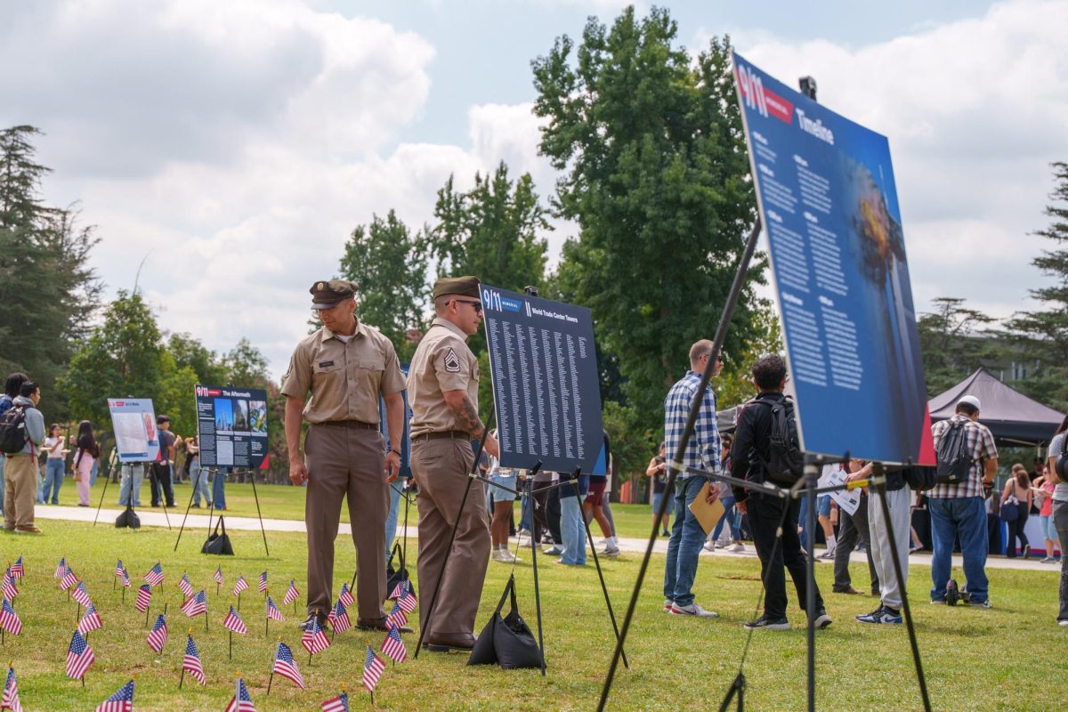 Staff Sgt. Rincon and an army NCO view the CSUN 9/11 memorial, Northridge, Calif. Thursday, Sept. 11, 2025.