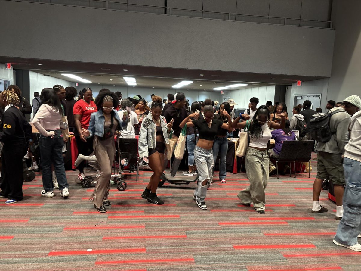 Students and other attendees dance at Cultural Welcomes: Welcome Black event  in Northridge, Calif. on Wednesday, Sept. 17 at the University Student Union.
