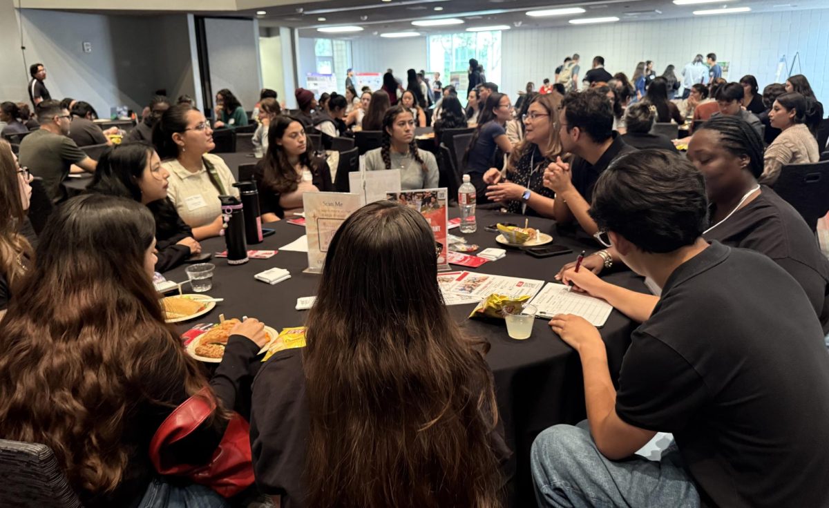 Students chat with potential mentors during the Research Faculty Mixer at CSUN's Office of Undergraduate Research's 8th annual Getting into Research event on Sept. 26. 