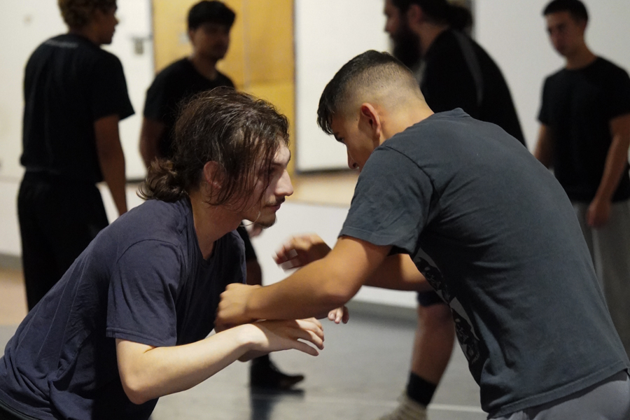 CSUN Wrestling Club memebers Andrew Paul (left) and Ayden Artem-Abuemeira practice moves in Redwood Hall on Oct. 10, 2025.