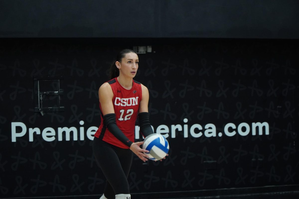 Outside Hitter Julia Bazylevych prepares to serve the ball during a game against UC Davis in Northridge, Calif., on Oct. 18, 2025. The Matadors lost 0-3 (7-25, 16-25, 16-25.)