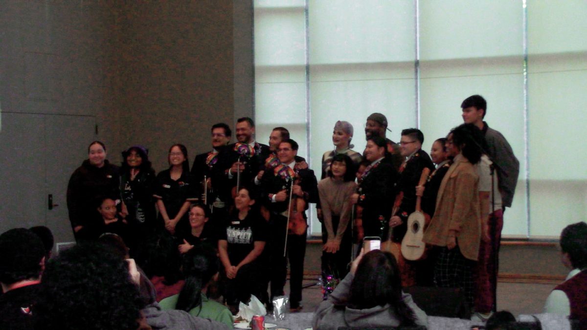 USU members, Mariachi Arcoriris and Cynthia Lee Fontaine take a center stage photo at the Grand Salon on Oct. 14 in Northridge, Calif.