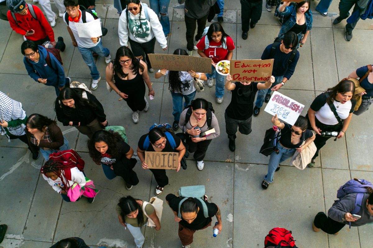 Protestors walk through the CSUN campus in Northridge, Calif., on Feb. 18, 2025. Around 200 CSUN students staged a walk-out to protest President Donald Trump's immigration policies.