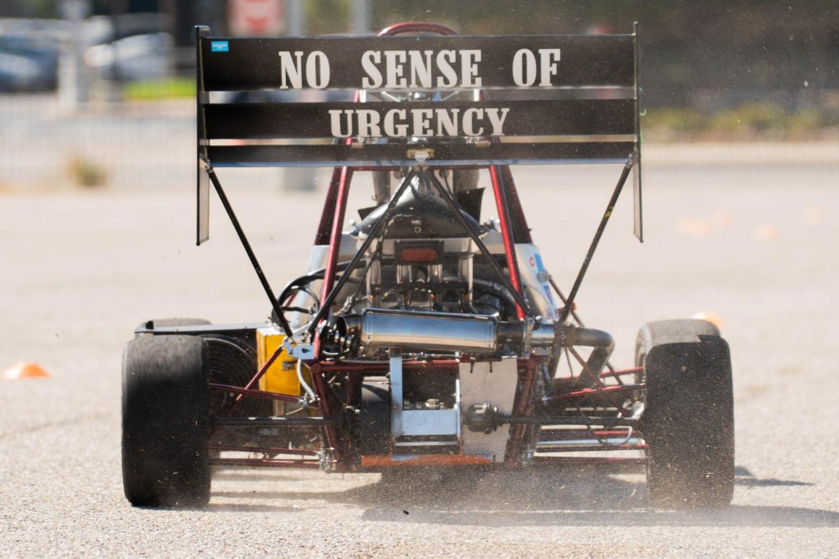 CSUN's Formula SAE driver Xinping Wang drives a test lap at the F10 parking lot on Sept. 6, 2025.
