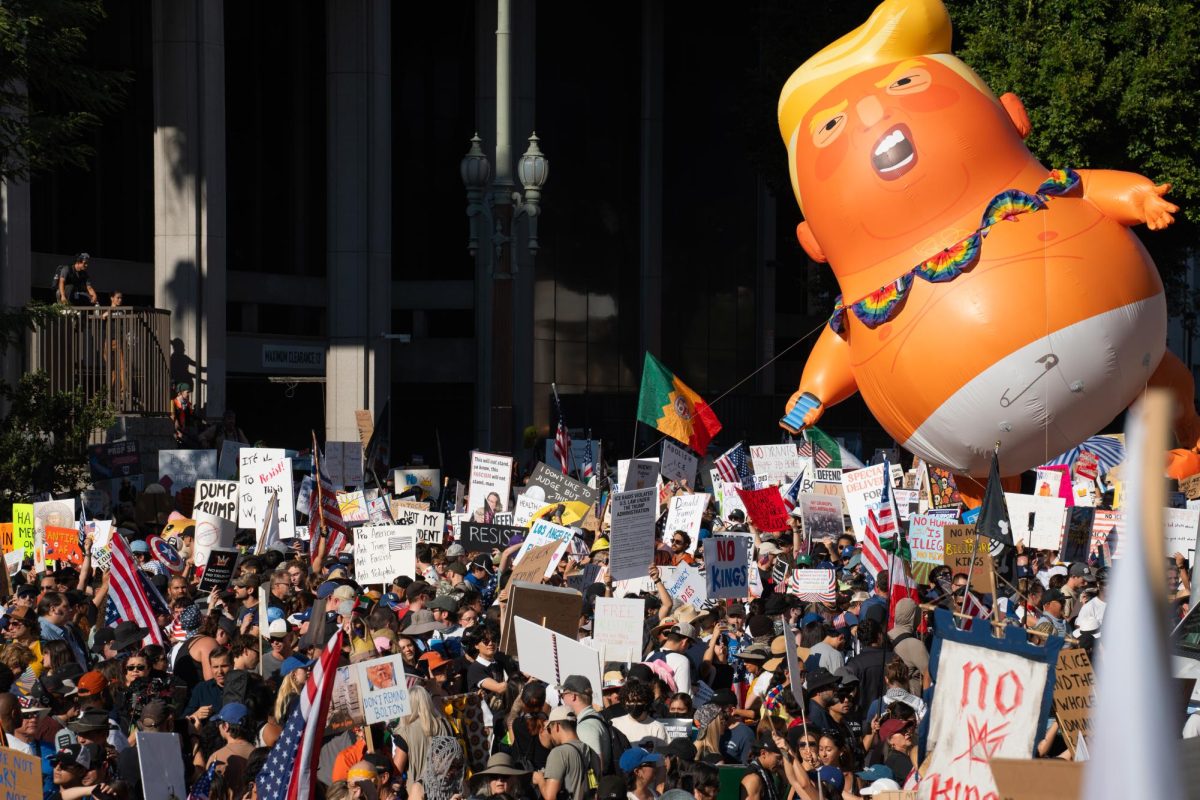 Protesters at No Kings 2 return to City Hall after marching around the metropolitan area in downtown Los Angeles on Oct. 18, 2025.