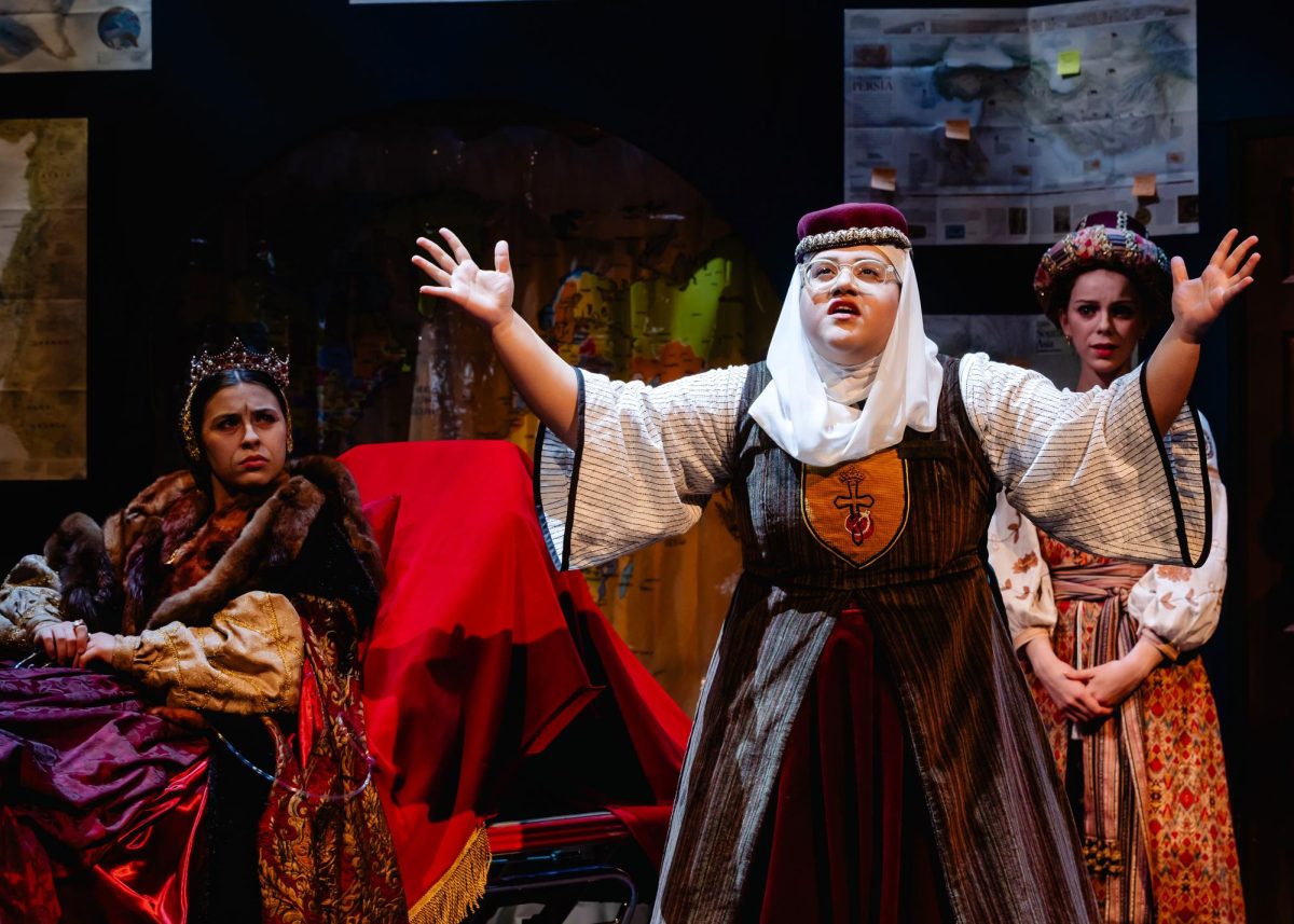 HRH Queen Isabella played by Jessica Pantaleon (left) with the Maid played by Jazzmynne Silva (middle) and Maxima Terriblé Segunda (right) portrayed by Hannah Leigh West in "The Hunchback of Seville."