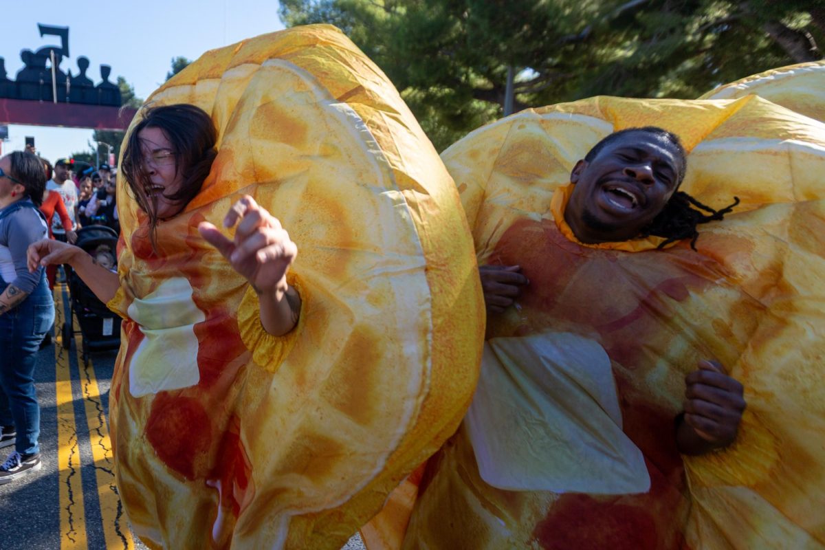 People in Eggo inflatable costumes dance during One Last Ride by CicLAvia in Los Angeles on Nov. 23, 2025. The last CicLAvia event of the year was a collaboration with Netflix's "Stranger Things."