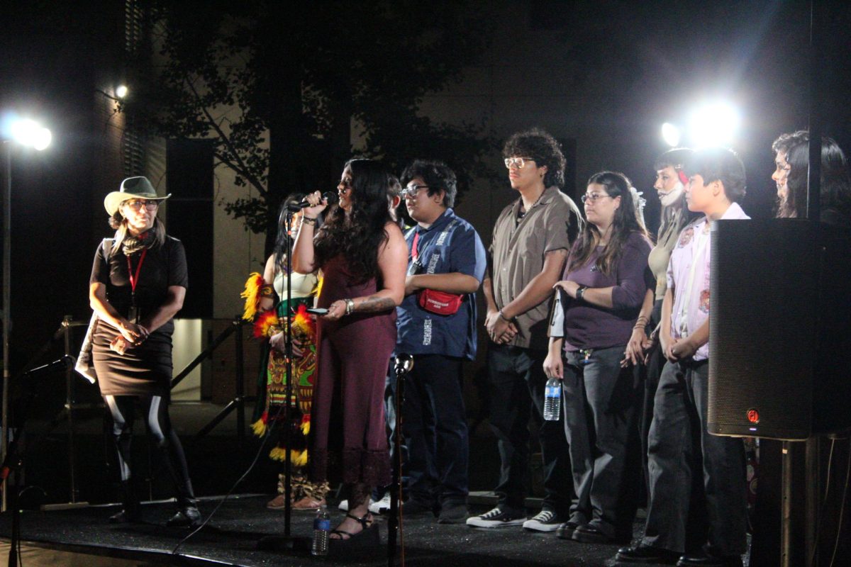 M.E.Ch.A on the stage during their speech at the Miccaihuitl event on Nov. 1, 2025.