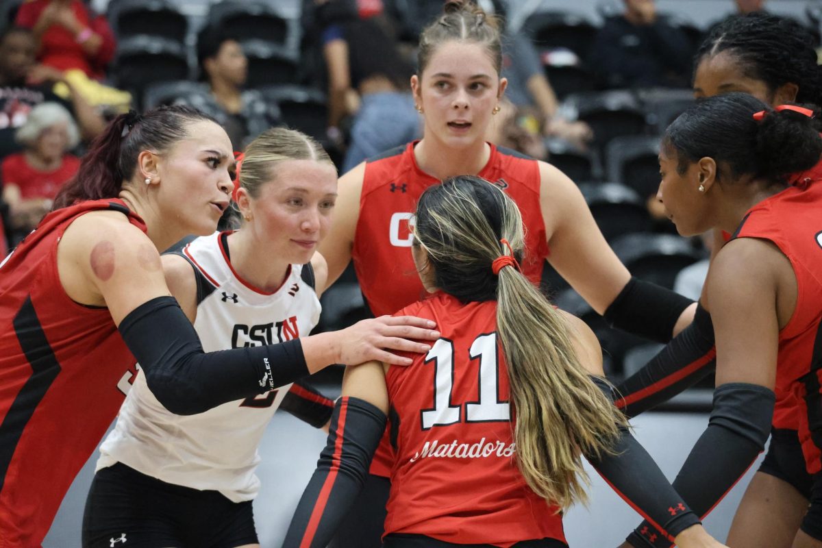 Players huddle to celebrate a score during a game against the Cal Poly Mustangs in the Premier America Credit Union Arena on Nov. 1, 2025. The Matadors lost 3-2.