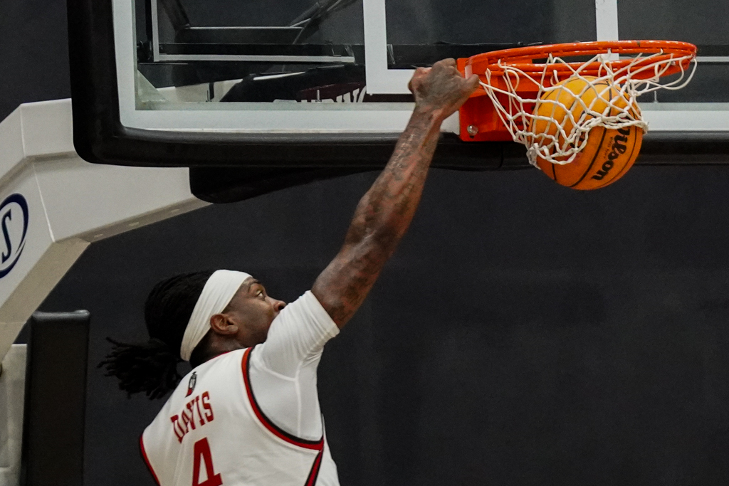 Josiah Davis dunks the ball during a game against Troy University at Premier America Credit Union Arena in Northridge, Calif. on Nov. 16, 2025.