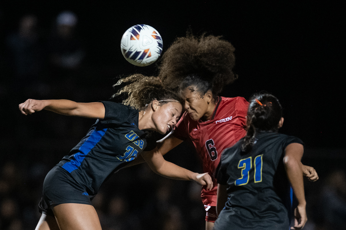 Keilani Claiborne (right) and Mya Delaney (left) head-butt each other while trying to field the ball during a Big West semi-final playoff match against UC Santa Barbara in Northridge, Calif., on Nov. 6, 2025. The Matadors lost 3-2 in a shootout.