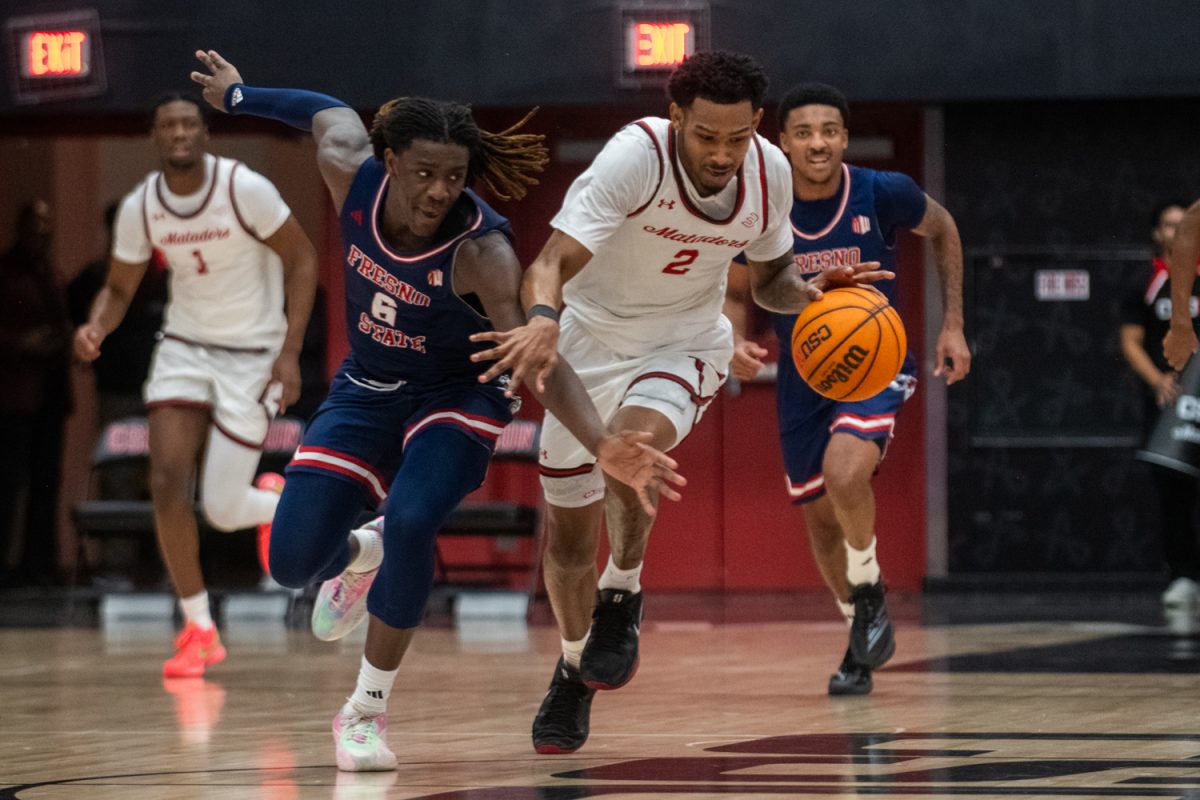 Larry Hughes II (right) attempts to fastbreak during a game against Fresno State at the Premier America Credit Union Arena on Dec. 10, 2025. The Matadors won 89-87.
