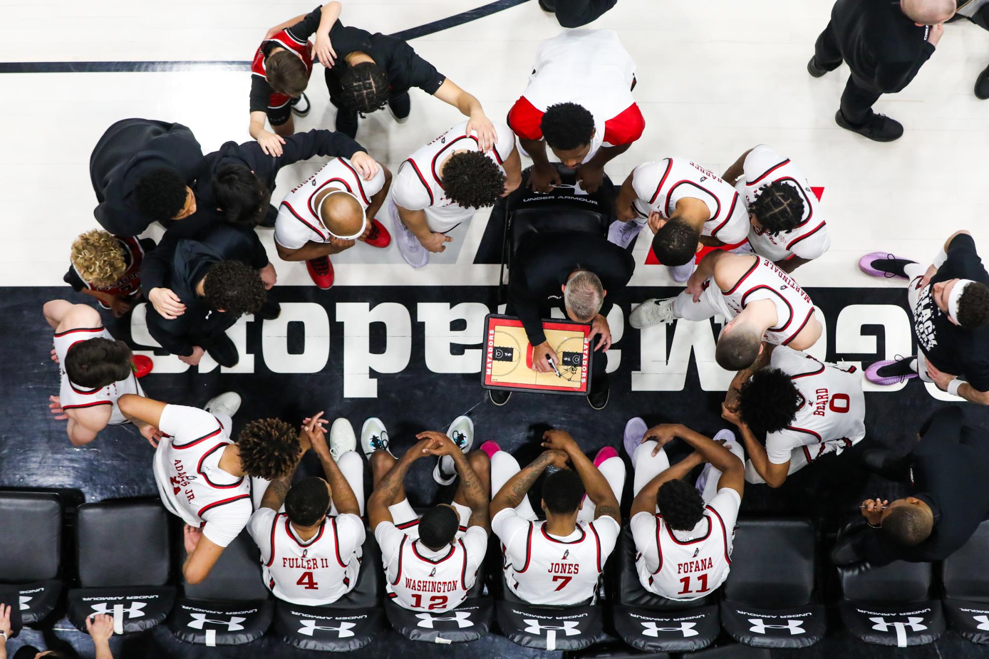 CSUN head coach Andy Newman speaks to players during a game against UC San Diego at the Premier America Credit Union Arena in Northridge, Calif., on Feb. 27, 2025. The Matadors lost 71-77.
