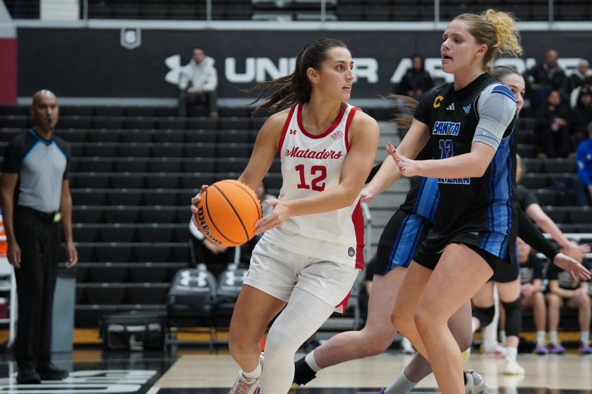CSUN Guard Erika Aspajo (left) passes the ball during a game against UCSB at Premier America Credit Union Arena in Northridge, Calif. on Feb. 19, 2026.