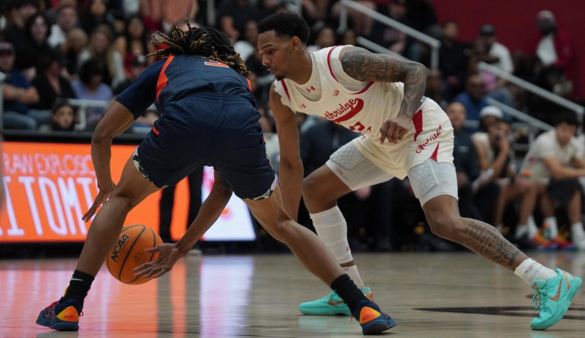 CSUN guard Larry Hughes II guards CSUF guard Joshua Ward at Premier America Credit Union Arena on March 7, 2026.