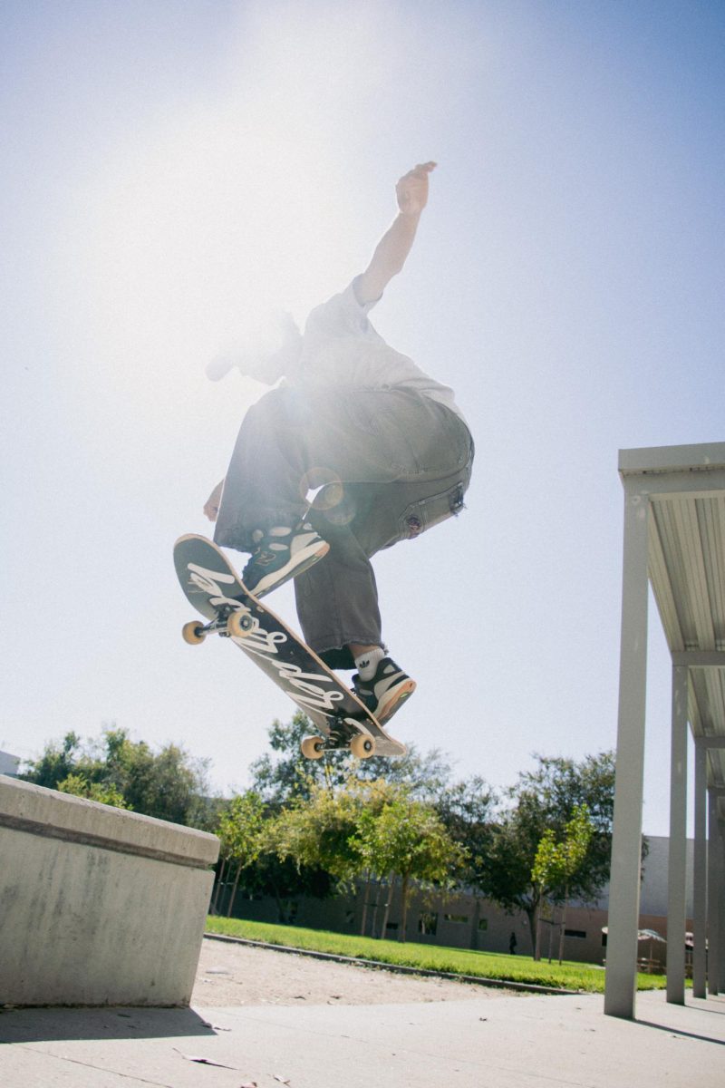 A skater ollies off a curb on September 29, 2025 at Manzanita Hall in Northridge, Calif.