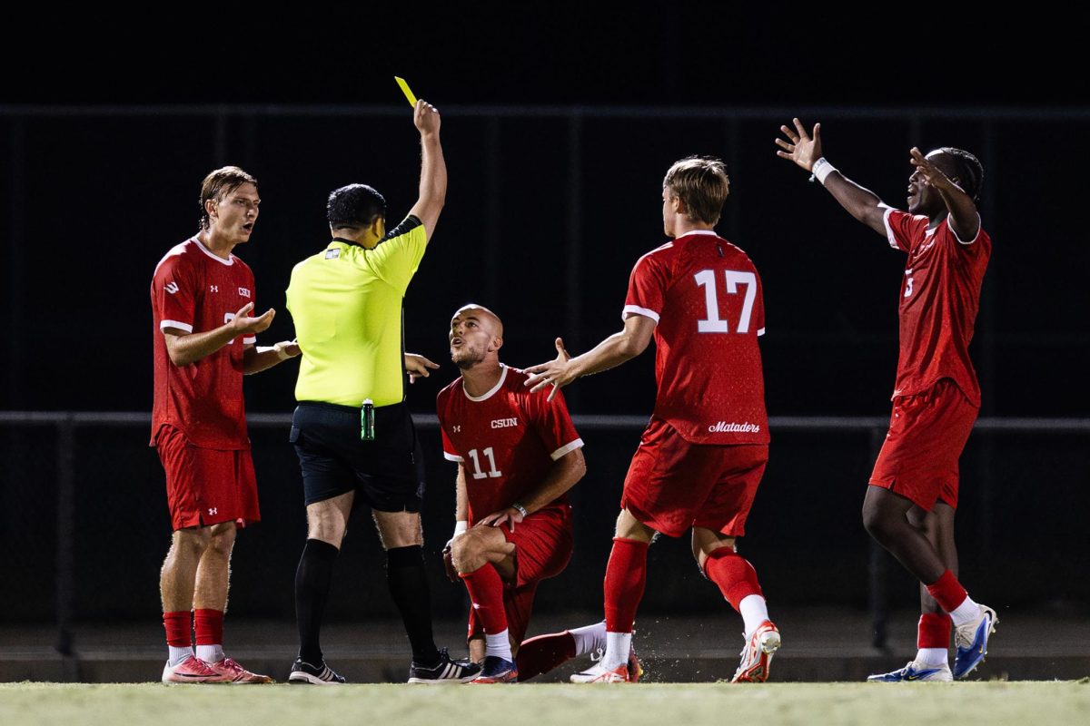 The Matadors react as the referee issues CSUN Forward Yart Van Lieshout (11) a yellow card during the Matadors 7th game of the season against San Jose State University on Thursday, Sept. 17, 2026 in Northridge, Calif. The game ended 1-0 with San Jose taking home the win.