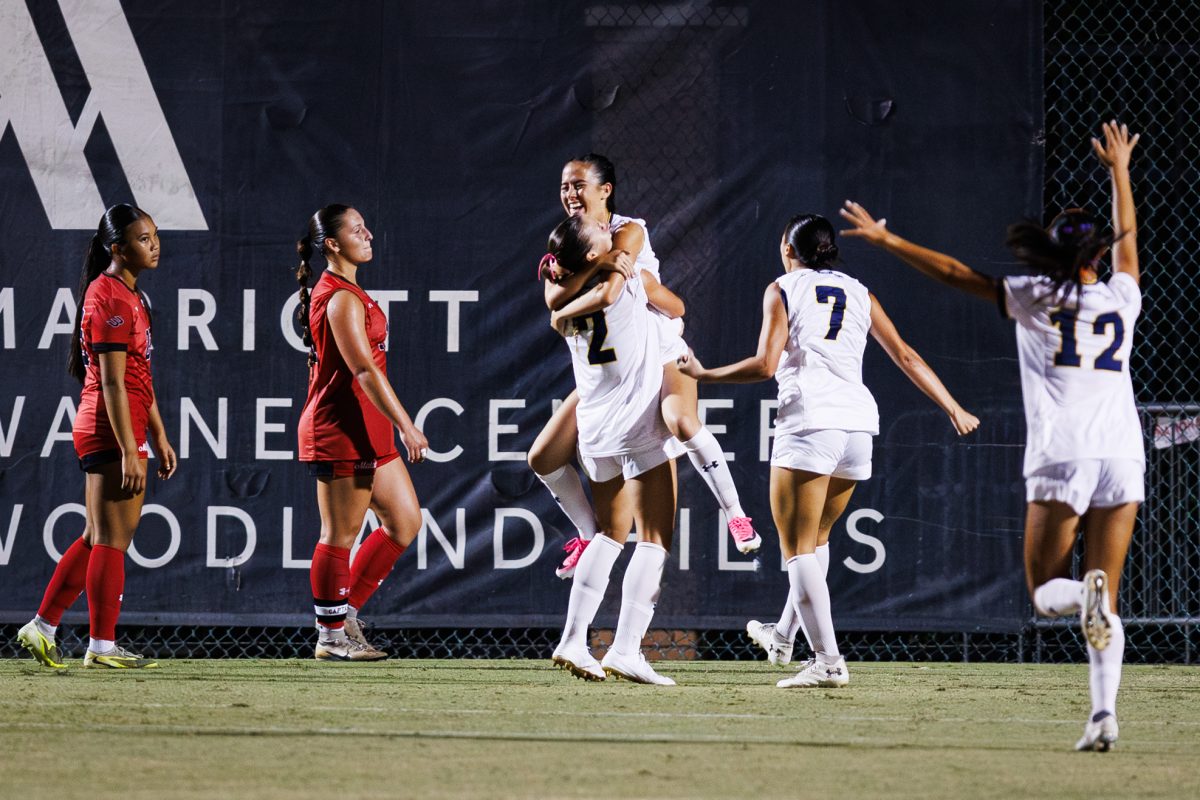 UCSD Midfielder/Forward Kennadi Borg (8) celebrates with the team after scoring during the Big West Conference opener between the CSUN Matadors and the UC San Diego Tritons on Wednesday, Sept. 23, 2026, in Northridge, Calif. UCSD beat CSUN 1-0.