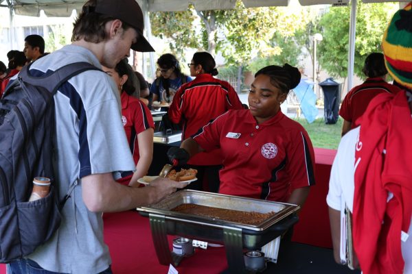 Students wait in line to get served various kinds of foods at the Presidents Picnic at Bayramian Lawn in Northridge, Calif., on Thursday, Sept. 3, 2026.