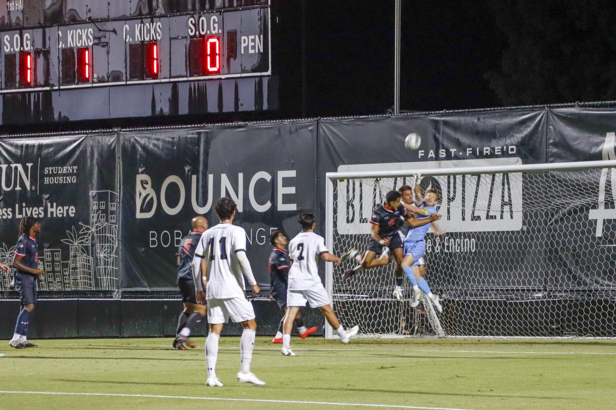 Dominik Wicks of CSUN, left, and Nic Thiele of UCSD collide in mid-air while contesting a header in front of the goal during the first half of a men's soccer match at Matador Soccer Field in Northridge, California, Oct. 21. CSUN defeated UC San Diego 3-2.