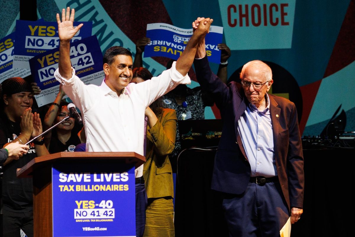 Rep. Ro Khanna, D-Calif., joined hands with Sen. Bernie Sanders, I-Vt., at the Ballots Over Billionaires rally in Los Angeles on Monday, Oct. 5, 2026.