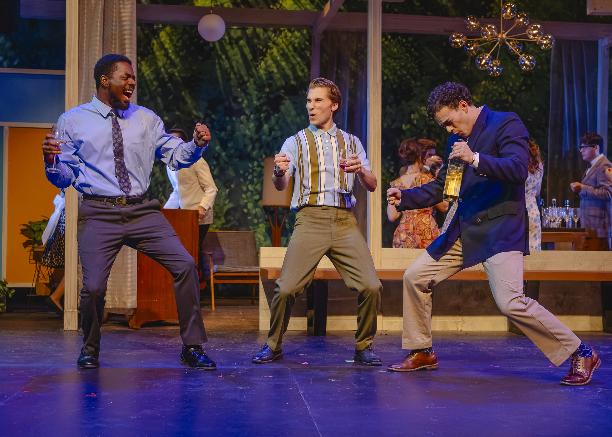 Michael Platonov, played by David Woods Jr. (left), Seymour Peterson, played by William Flannery (middle), and Dr. Nicholas Triletsky, played by Liam Sacramento (right) together talking and driking during their gathering in the production of "Platonov: An Unfinished Paty" in the Little Theatre, in Northridge, Calif. on Oct. 6, 2026.