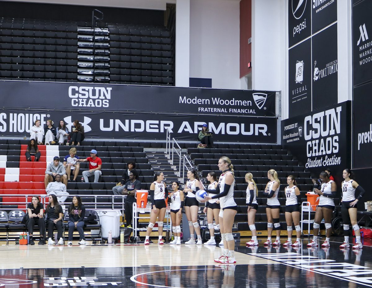 CSUN outside hitter Fallyn Blotzer prepares to serve during a match against CSU Bakersfield in Northridge, California, on Friday, Oct. 23.