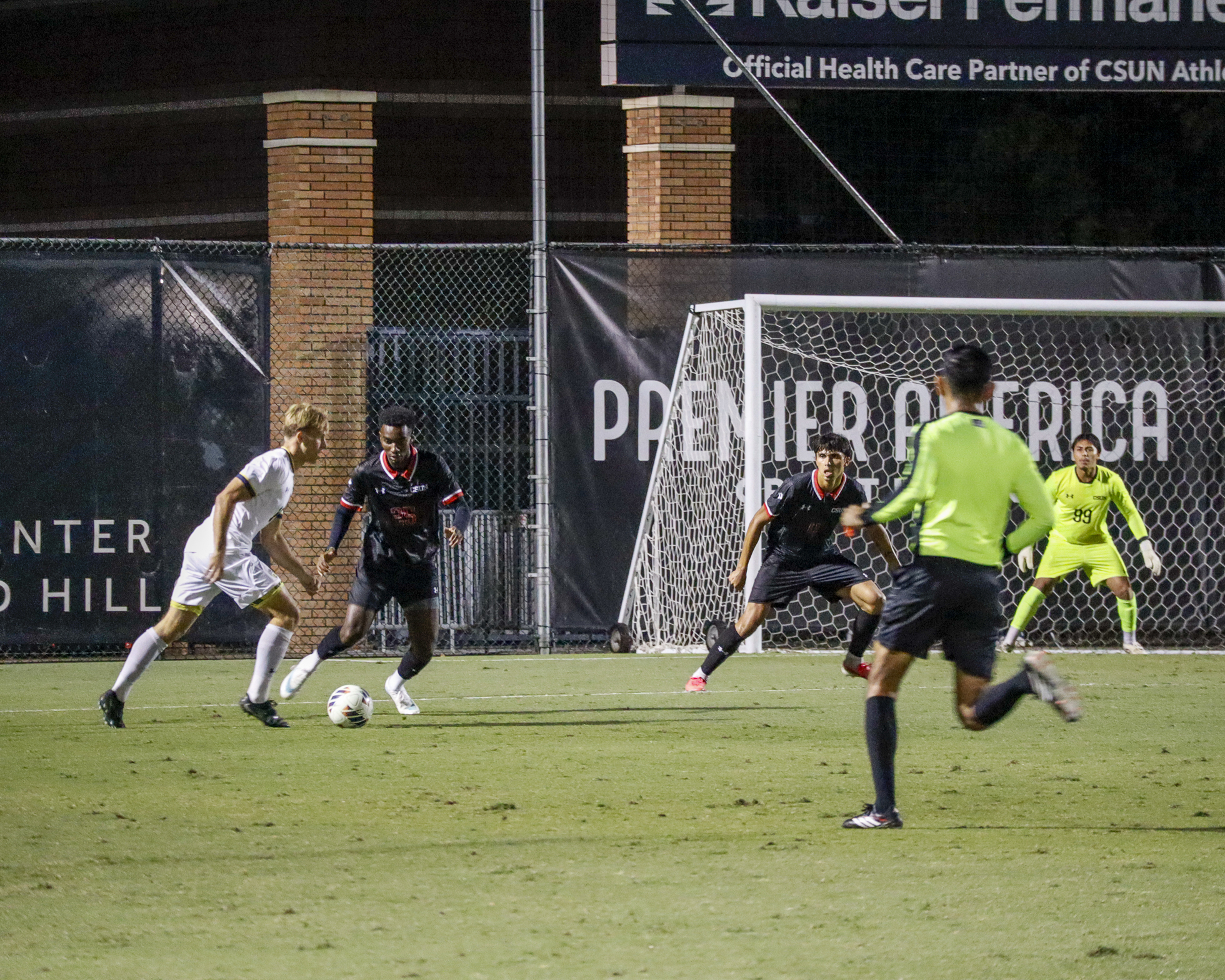 California State University, Northridge defenders Abdallah Traore (left) and Daniel Garcia (center) defend against a University of California, San Diego player during a men's soccer match at Matador Soccer Field in Northridge, Calif., on Wednesday, Oct. 21, 2026.